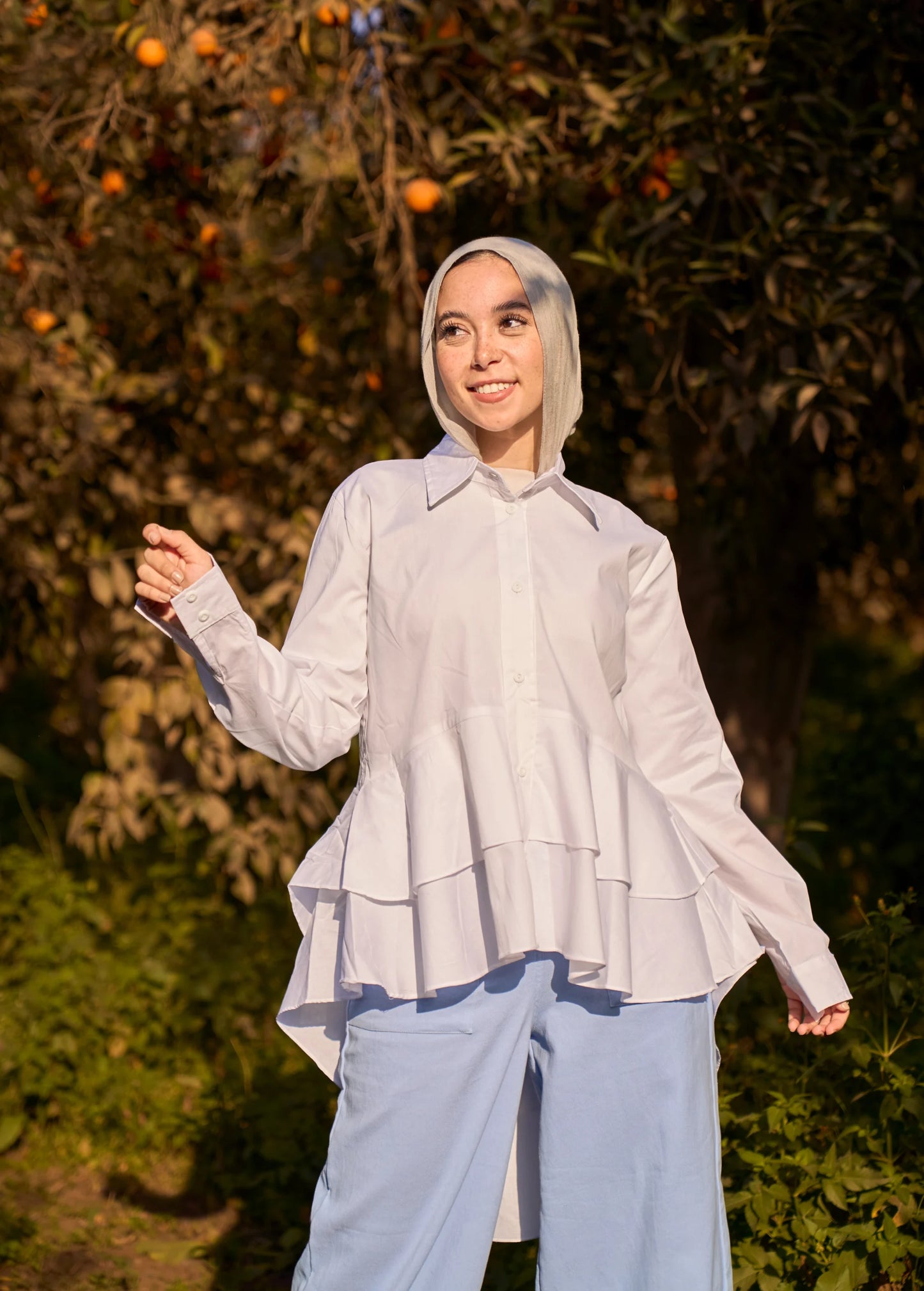 White lotus blouse