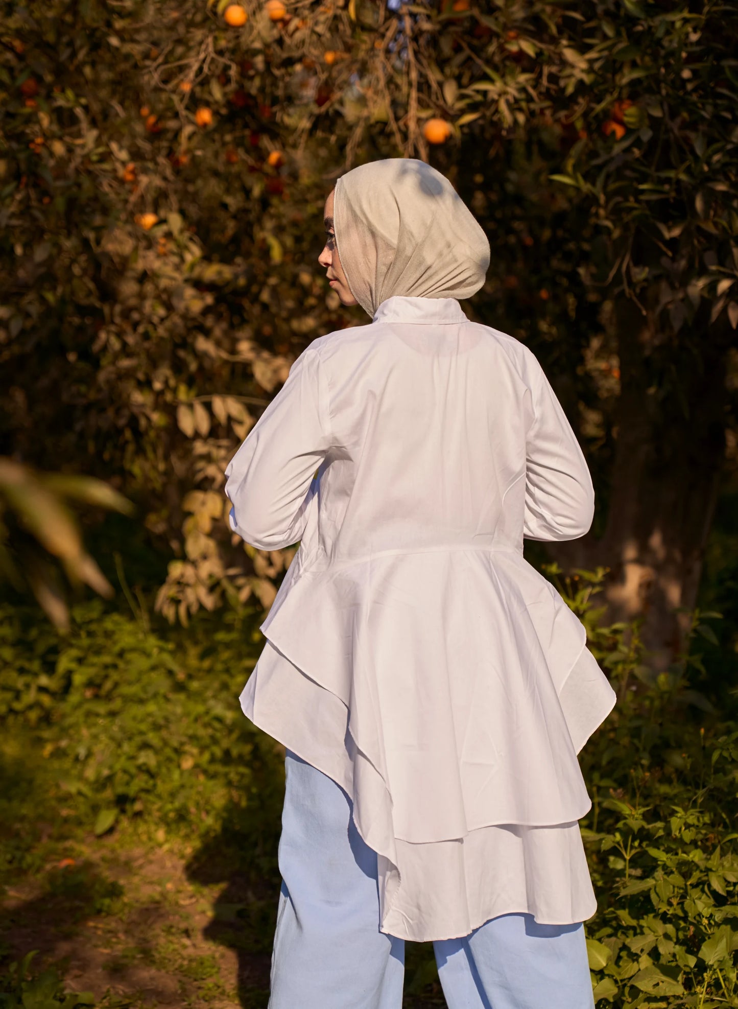 White lotus blouse